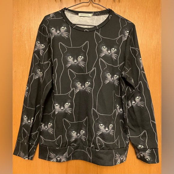 Black sweater covered in black cats - Picture 1 of 1